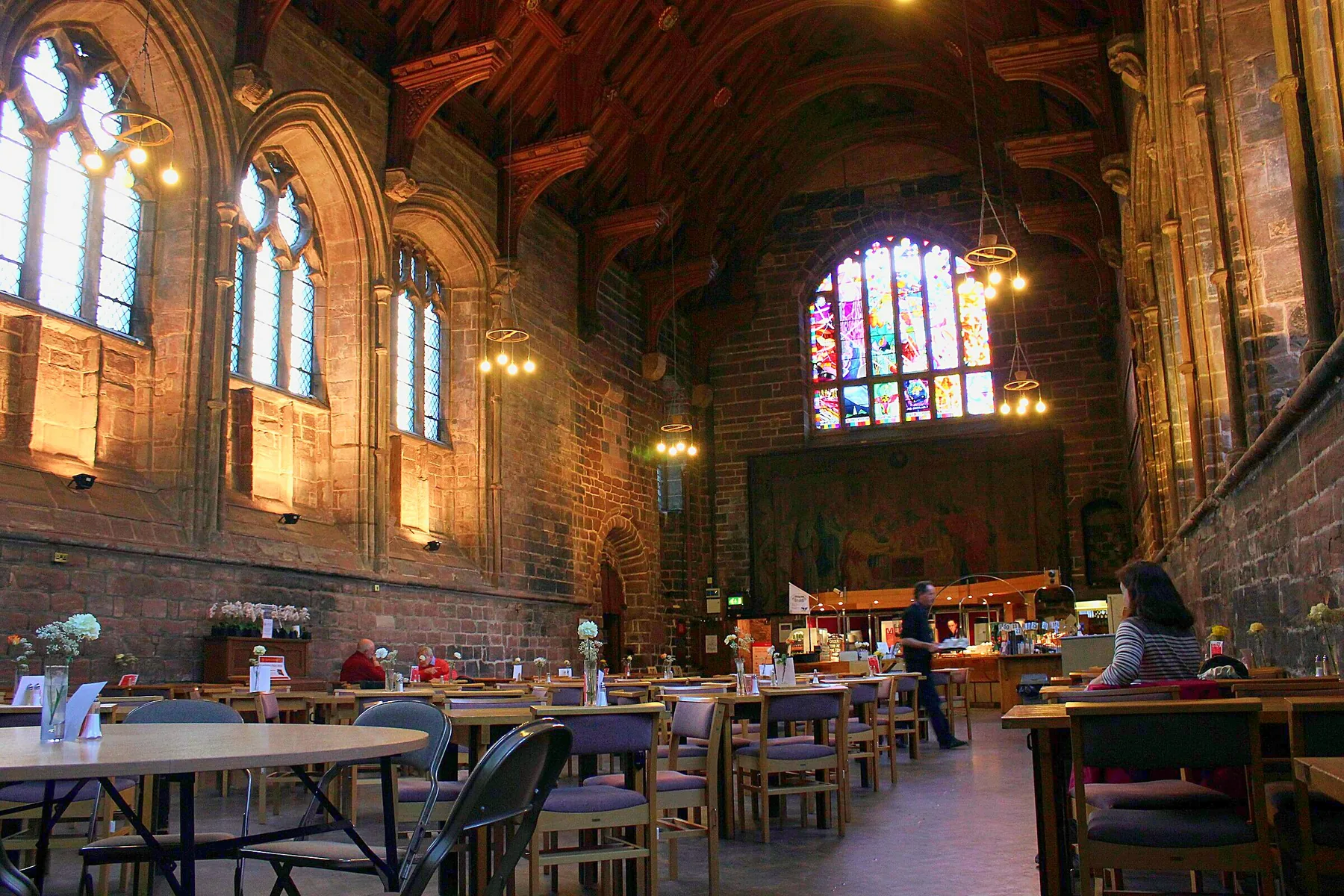 Café 1092 in the monks' dining hall at Chester Cathedral, with stained glass high on the far wall