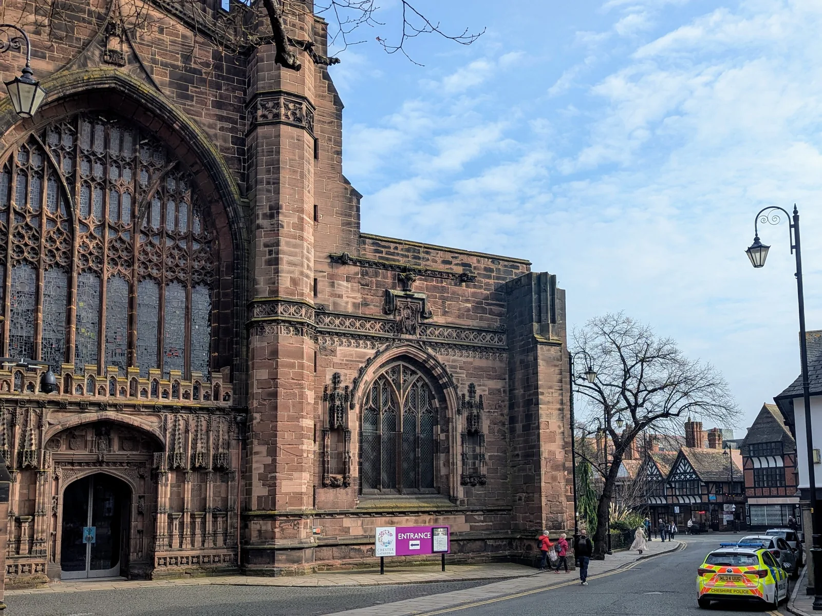 The red sandstone front of Chester Cathedral on a sunny day
