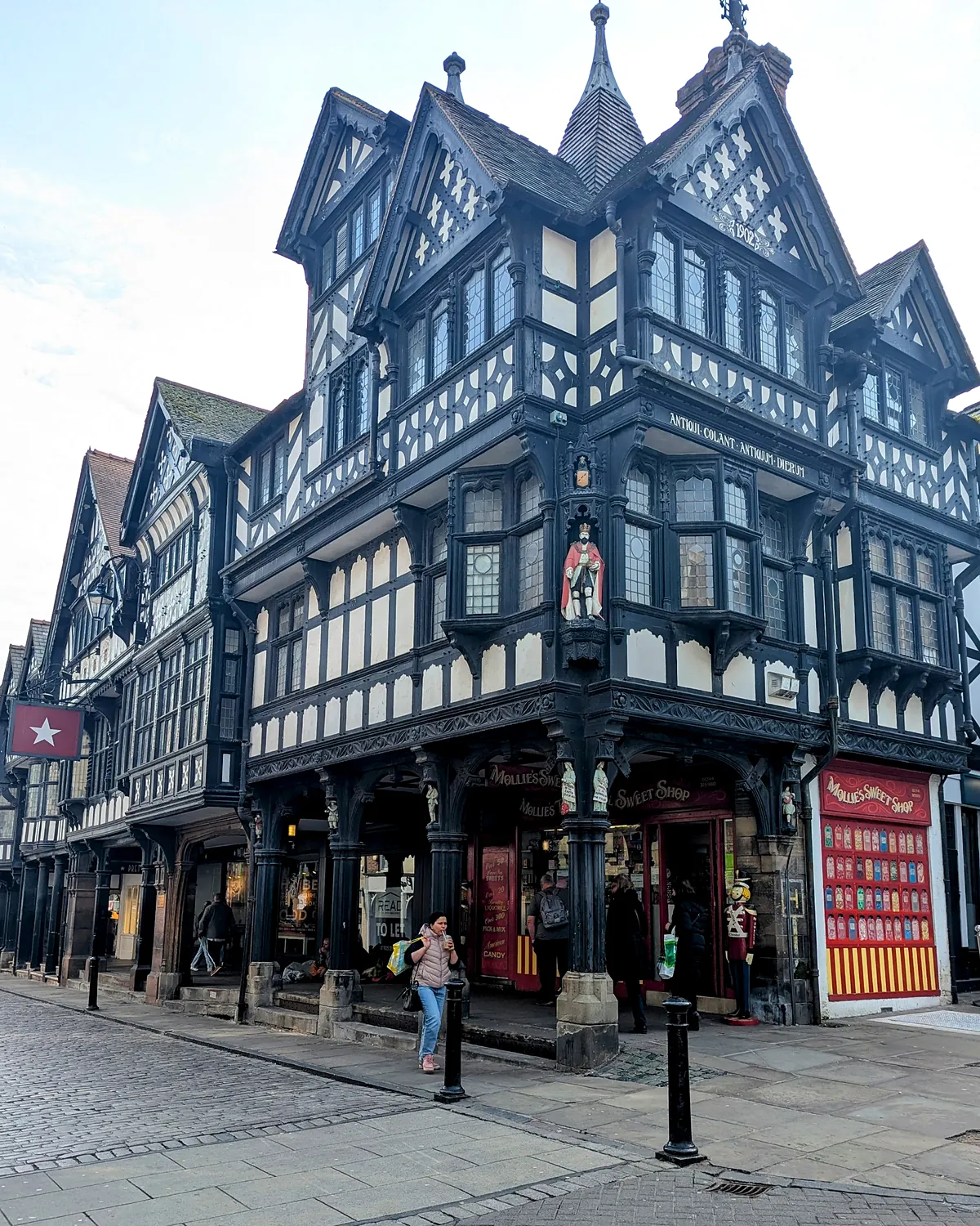 The black and white timbered Rows on Bridge Street in sunshine