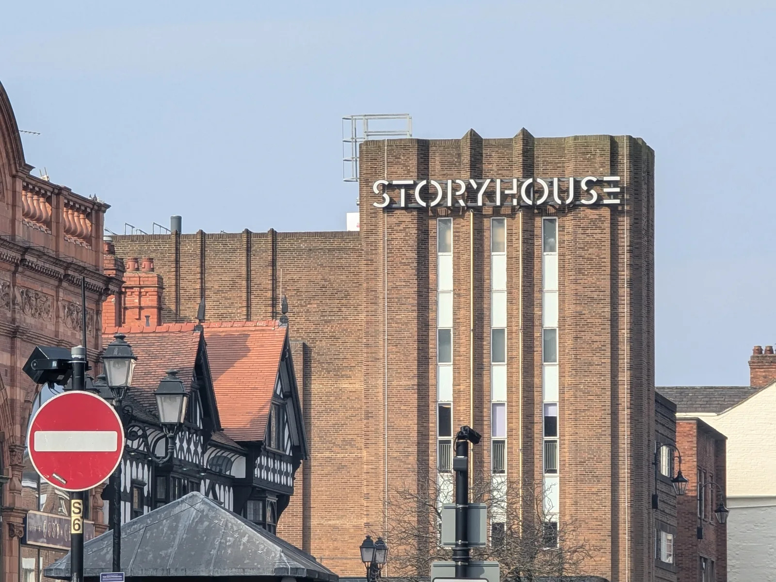 The Storyhouse tower and sign above the Chester rooftops