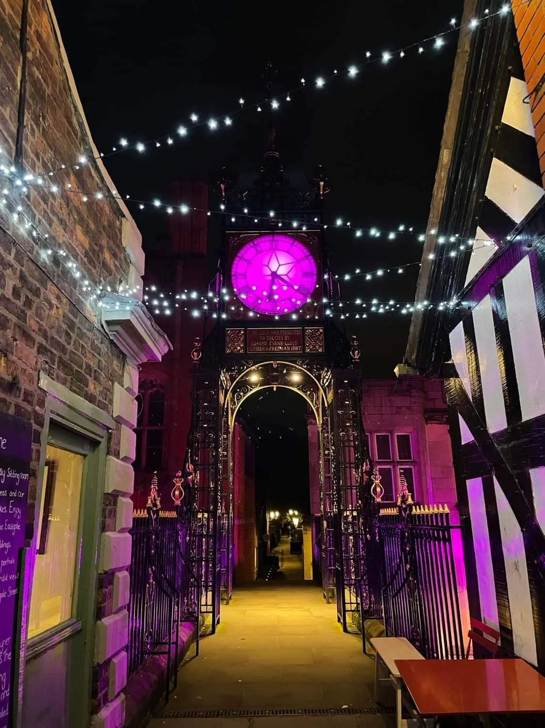 Christmas lights and a giant pink bauble by the Eastgate Clock