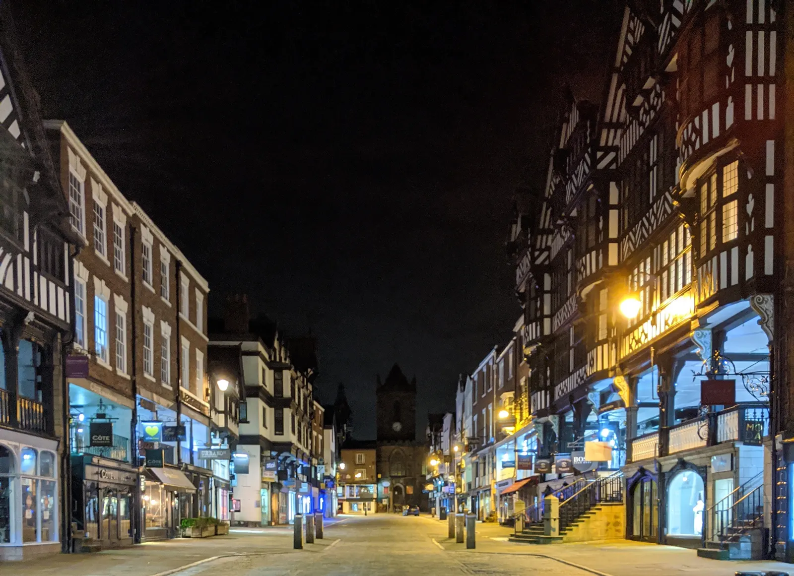 Chester's timber-framed city centre buildings lit up at night