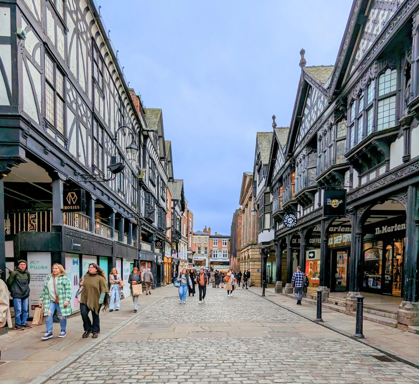 Springtime view along Chester's historic Rows and cobbled city-centre street
