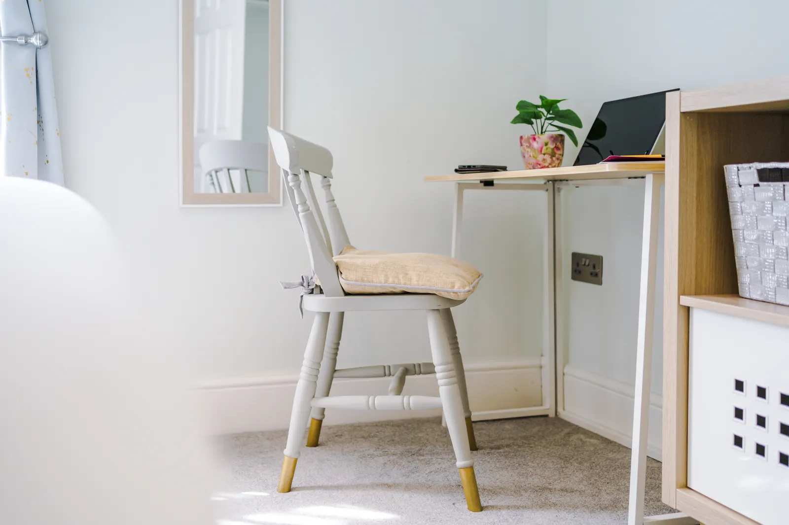 Quiet desk workspace with chair and storage in the second bedroom