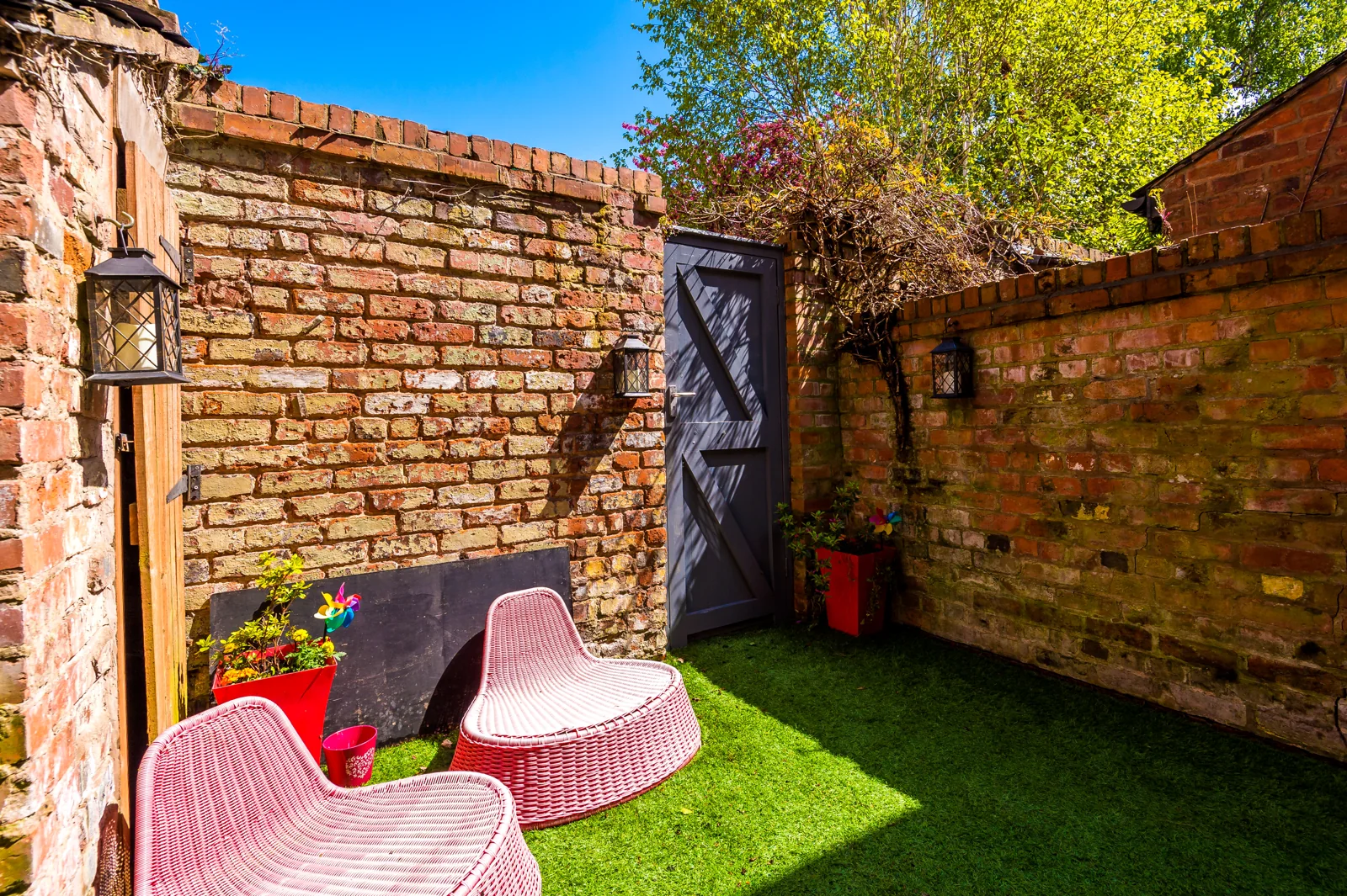 The private walled garden with seating